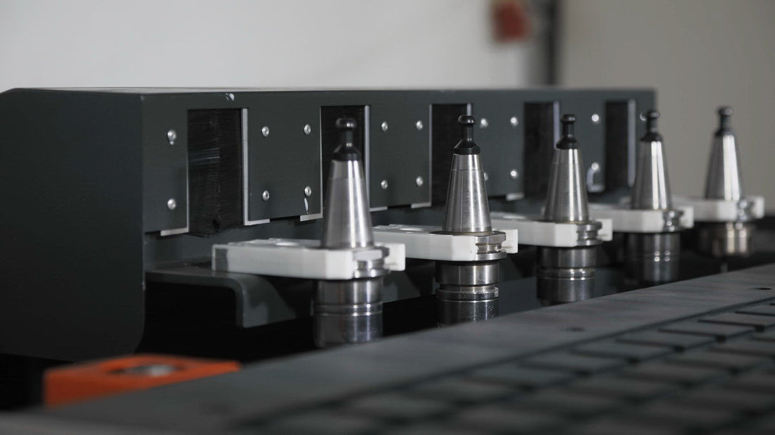 CNC tool holders and ER collets guide showcasing ER20, ER25, ER32 tool holders in a machine setup.