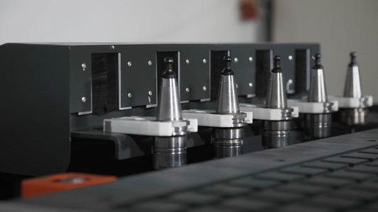 CNC tool holders and ER collets guide showcasing ER20, ER25, ER32 tool holders in a machine setup.